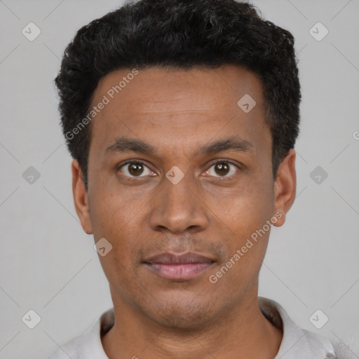 Neutral latino young-adult male with short  black hair and brown eyes