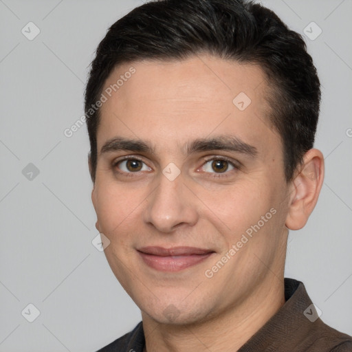 Joyful white young-adult male with short  brown hair and brown eyes