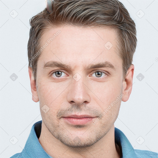 Neutral white adult male with short  brown hair and grey eyes