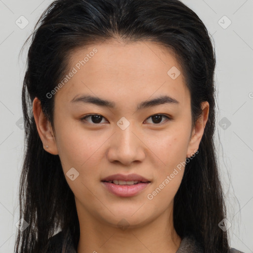 Joyful asian young-adult female with long  brown hair and brown eyes