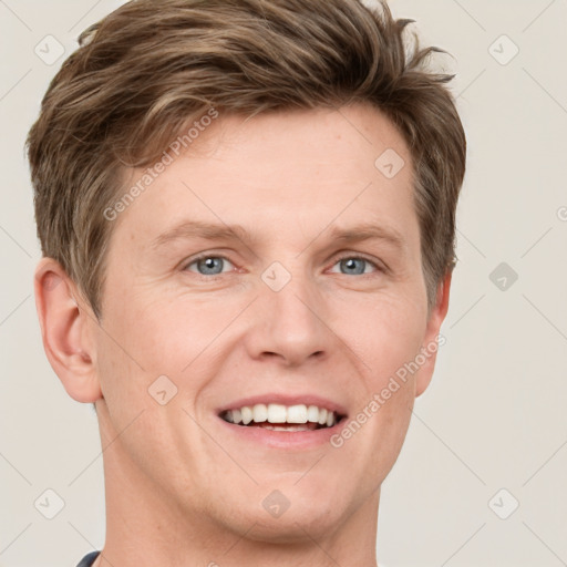 Joyful white adult male with short  brown hair and grey eyes