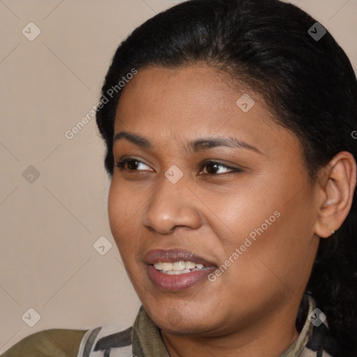 Joyful latino young-adult female with short  black hair and brown eyes