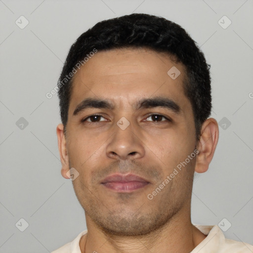 Neutral latino young-adult male with short  black hair and brown eyes