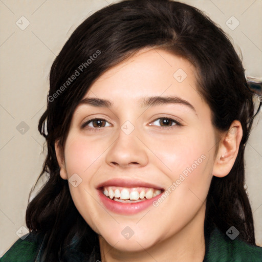 Joyful white young-adult female with long  black hair and brown eyes