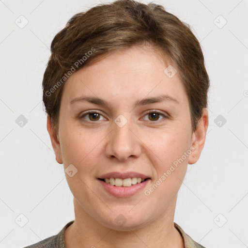 Joyful white young-adult female with short  brown hair and grey eyes