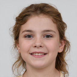 Joyful white child female with medium  brown hair and brown eyes