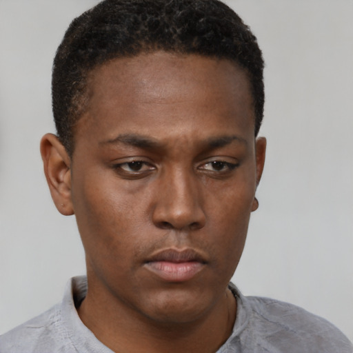Neutral black young-adult male with short  brown hair and brown eyes