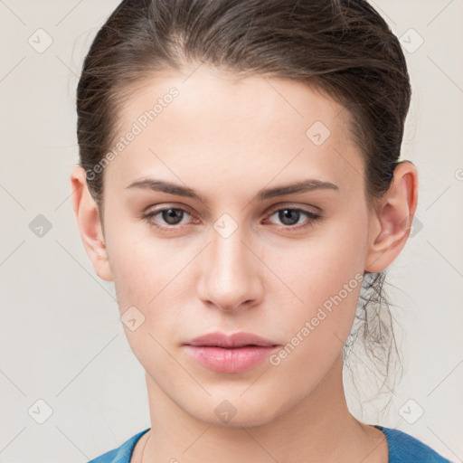 Neutral white young-adult female with medium  brown hair and grey eyes