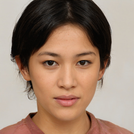 Neutral asian young-adult female with medium  brown hair and brown eyes