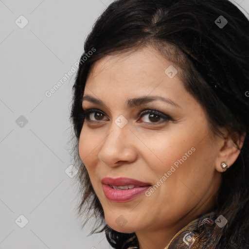 Joyful latino young-adult female with medium  brown hair and brown eyes