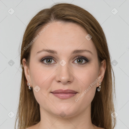 Joyful white young-adult female with long  brown hair and green eyes