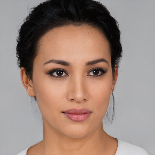 Neutral latino young-adult female with medium  black hair and brown eyes