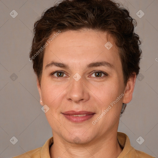 Joyful white adult female with short  brown hair and brown eyes