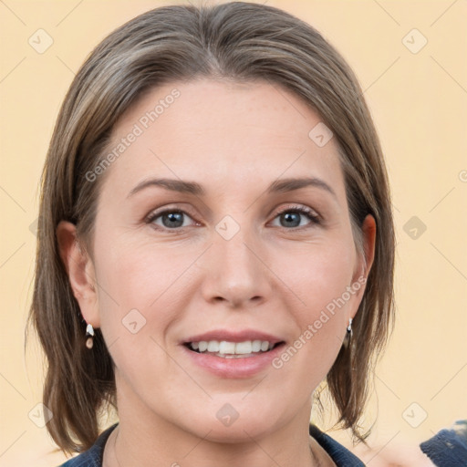 Joyful white young-adult female with medium  brown hair and grey eyes