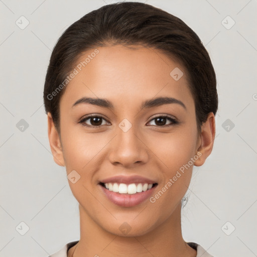 Joyful white young-adult female with short  brown hair and brown eyes