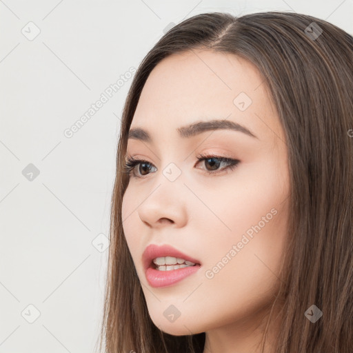 Neutral white young-adult female with long  brown hair and brown eyes