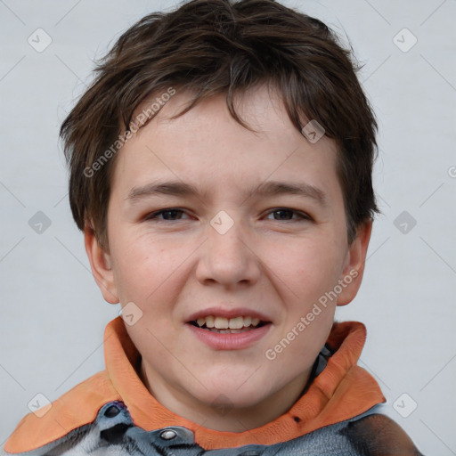 Joyful white child male with short  brown hair and brown eyes