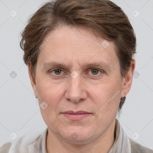 Joyful white adult male with short  brown hair and grey eyes