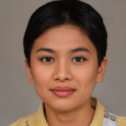 Joyful asian young-adult female with short  brown hair and brown eyes