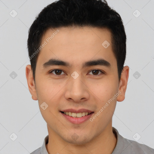 Joyful latino young-adult male with short  brown hair and brown eyes