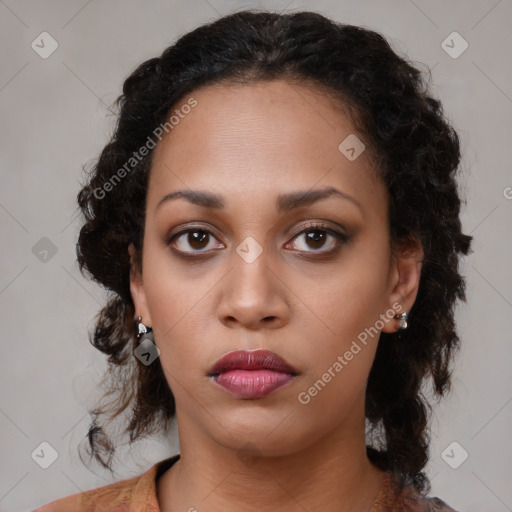 Neutral black young-adult female with medium  brown hair and brown eyes