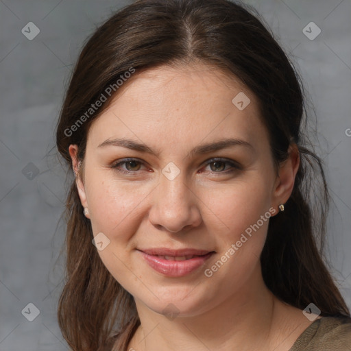 Joyful white young-adult female with medium  brown hair and grey eyes