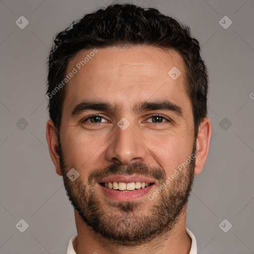 Joyful white young-adult male with short  black hair and brown eyes