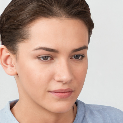 Neutral white young-adult female with short  brown hair and brown eyes