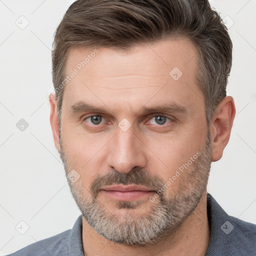 Neutral white adult male with short  brown hair and brown eyes