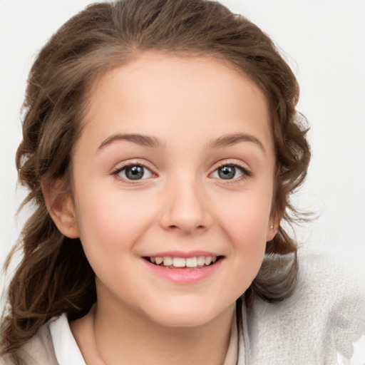 Joyful white child female with medium  brown hair and brown eyes