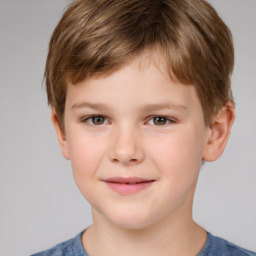 Joyful white child male with short  brown hair and brown eyes