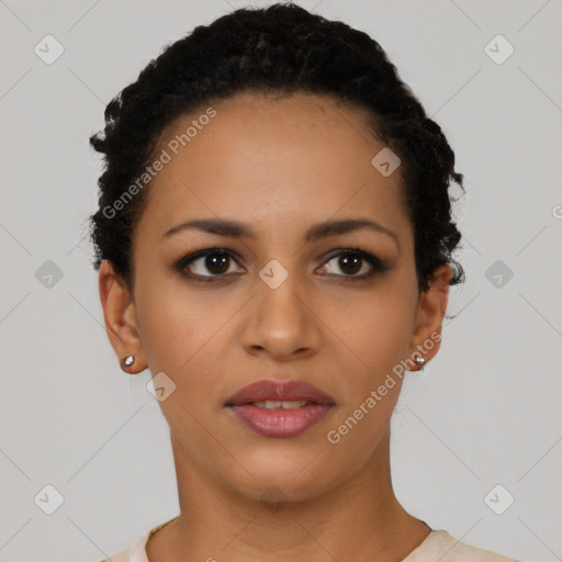 Joyful latino young-adult female with short  black hair and brown eyes