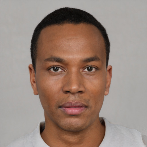 Neutral black young-adult male with short  black hair and brown eyes