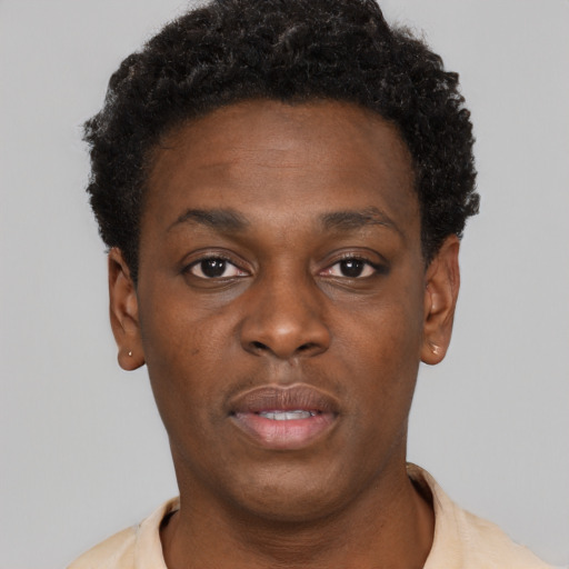 Neutral black young-adult male with short  brown hair and brown eyes