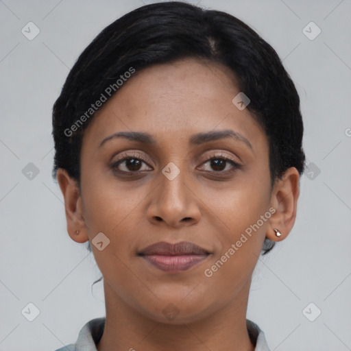 Joyful latino young-adult female with short  brown hair and brown eyes