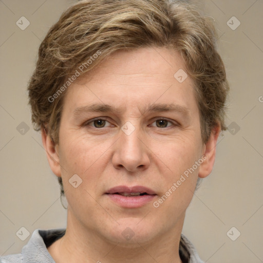 Joyful white adult female with short  brown hair and grey eyes