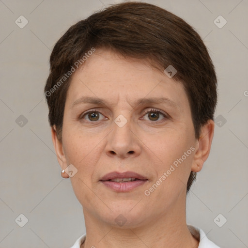 Joyful white adult female with short  brown hair and brown eyes