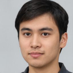 Neutral asian young-adult male with short  brown hair and brown eyes