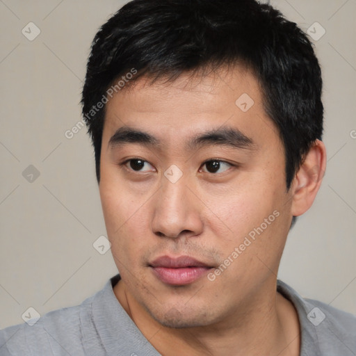 Neutral asian young-adult male with short  black hair and brown eyes