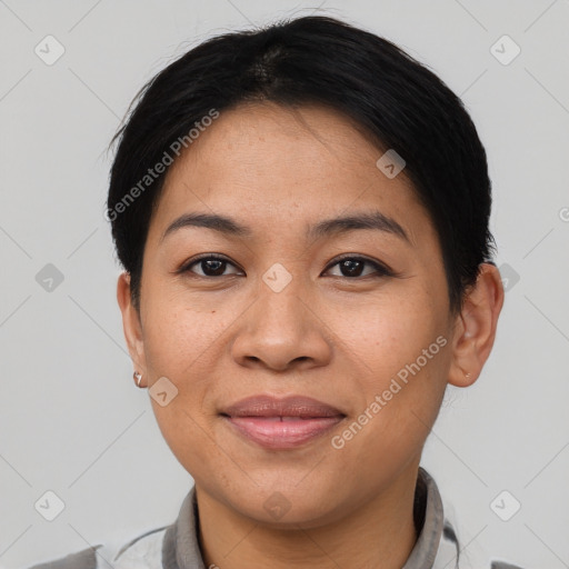 Joyful asian adult female with short  black hair and brown eyes