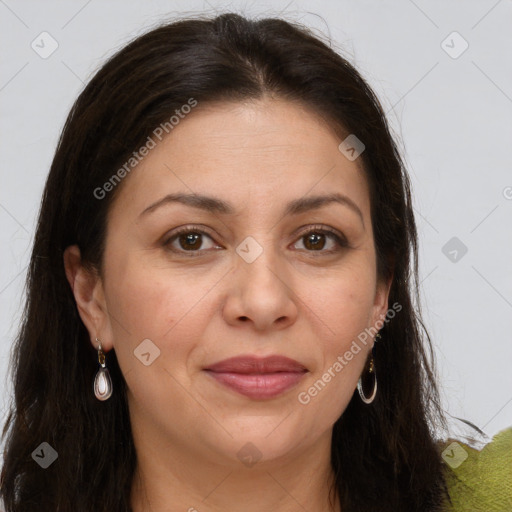 Joyful white adult female with long  brown hair and brown eyes