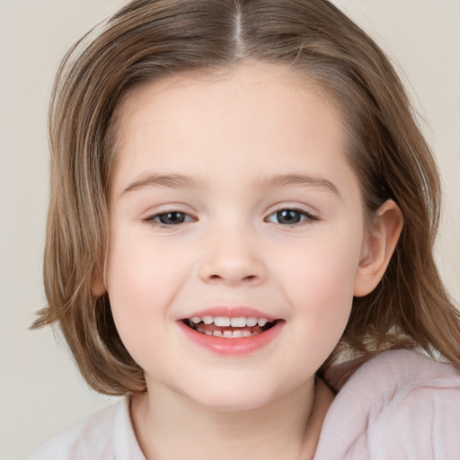 Joyful white child female with medium  brown hair and brown eyes