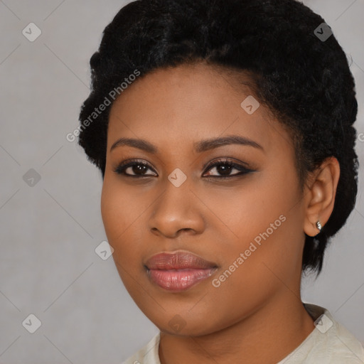 Joyful black young-adult female with short  black hair and brown eyes