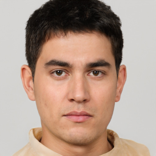 Neutral white young-adult male with short  brown hair and brown eyes