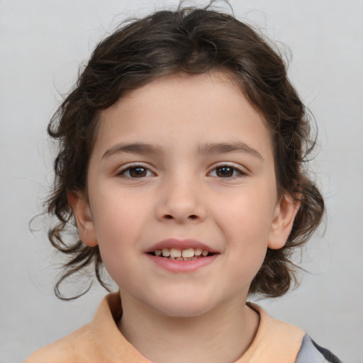 Joyful white child female with medium  brown hair and brown eyes