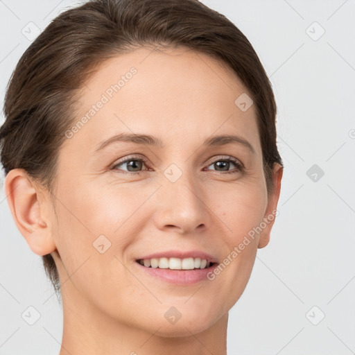 Joyful white young-adult female with short  brown hair and brown eyes