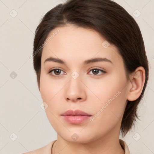 Neutral white young-adult female with medium  brown hair and brown eyes