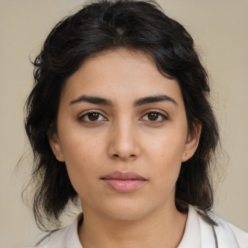 Neutral latino young-adult female with medium  brown hair and brown eyes