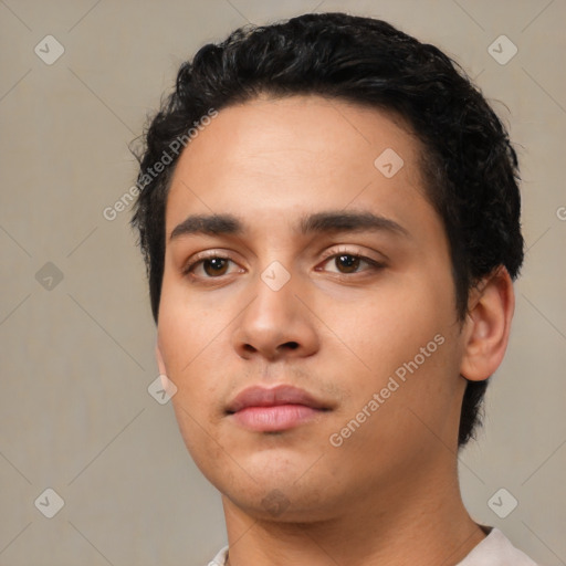 Neutral latino young-adult male with short  black hair and brown eyes