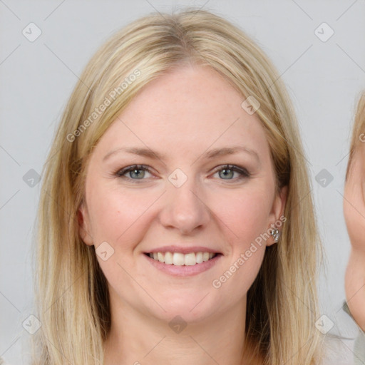 Joyful white young-adult female with medium  brown hair and blue eyes